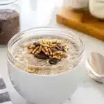 Overnight oats with flaxseed in rustic kitchen jar