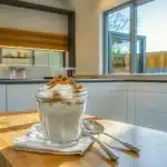 Served biscoff oats with toppings and coffee