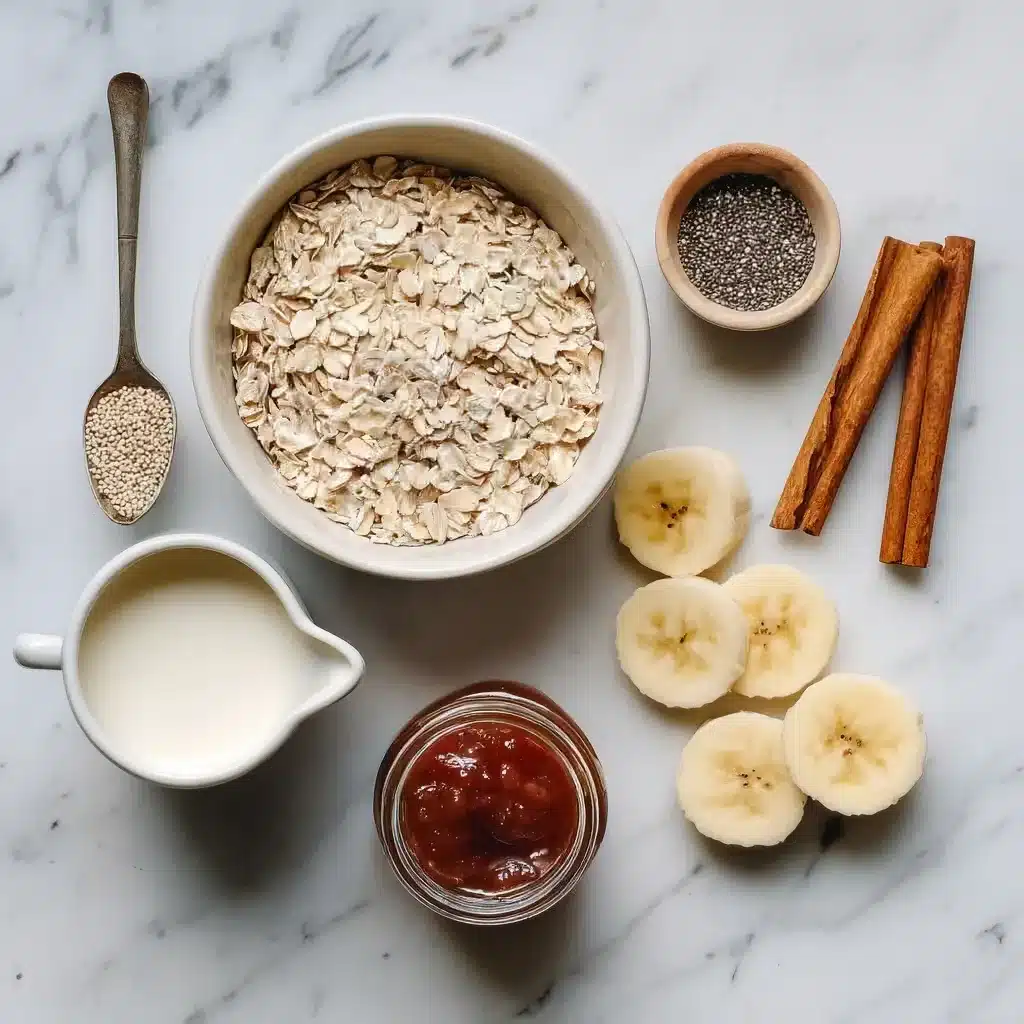 Glass jar of toddler overnight oats no added sugar, topped with banana slices and blueberries, on a white tabletop bathed in soft morning light