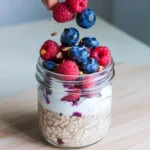 topping overnight oats with fresh low-sugar berries