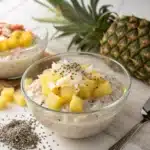 Pina Colada Overnight Oats in a tropical kitchen setting
