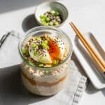 savory miso overnight oats in a jar with egg and scallions